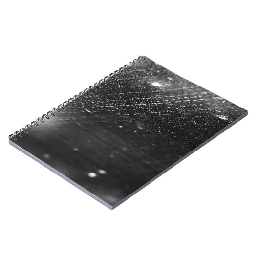 Zwarte en regenachtige laptop notitieboek (Linkerzijde)