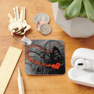 Zwarte en rode halve kruipen sleutelhanger