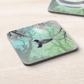 Zwarte en witte ballon op een meerset onderzetters (Linkerzijde)