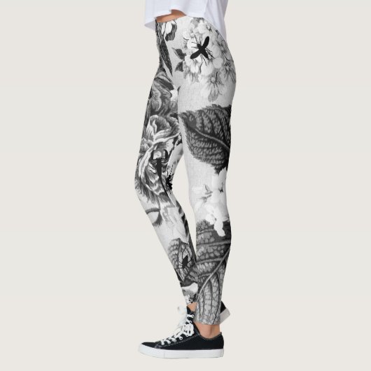 Zwarte en witte  bloemen met buik en bijen leggings (Links)