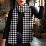 Zwarte en witte buffelkerst sjaal<br><div class="desc">Voeg een vleugje klassieke charme toe aan je wintergarderobe met deze zwart-witte buffalo plaid kerstsjaal. Met een tijdloos geruit patroon is deze lichtgewicht chiffon sjaal perfect voor gelaagdheid en geeft het een gezellig, rustiek gevoel aan je feestelijke kleding. Of het nu gaat om een vakantiebijeenkomst of om een doordacht cadeau,...</div>