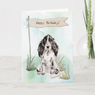 Zwarte en witte Cocker Spaniel Hond Onder Verjaard Kaart
