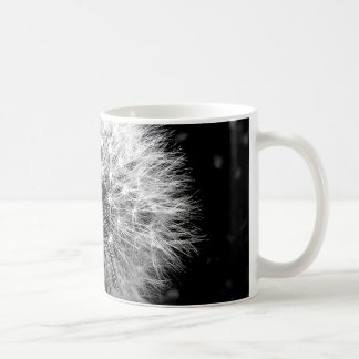 Zwarte en witte dandelion koffiemok