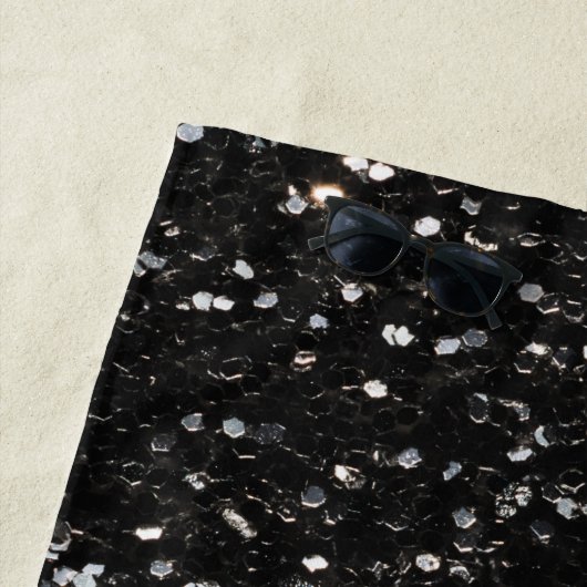 Zwarte en witte glinsterende glitssparken strandlaken (In situ)