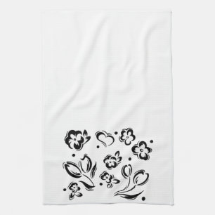 Zwarte en witte harten en bloemhanddoeken theedoek