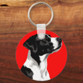 Zwarte en witte hond op gedurfde rode achtergrond sleutelhanger (Voorkant)