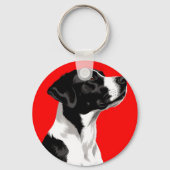 Zwarte en witte hond op gedurfde rode achtergrond sleutelhanger (Achterkant)
