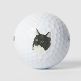 Zwarte en witte kat golfballen