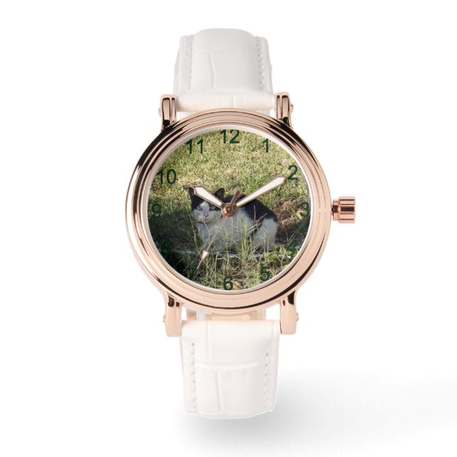 Zwarte en witte kat in de tuin, horloge (Voorkant)