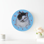 Zwarte en witte kat, klok (Huis)