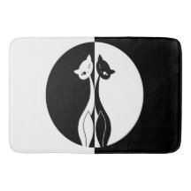 Zwarte en witte katten