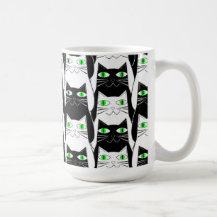 Zwarte en witte katten koffiemok