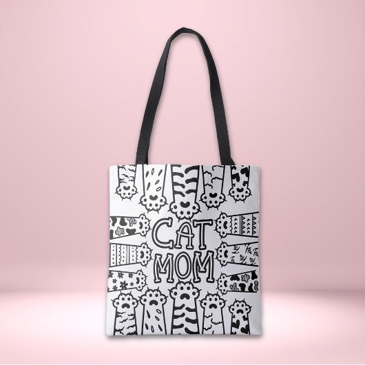 Zwarte en witte kattenmoeder met kattenpoten tote bag