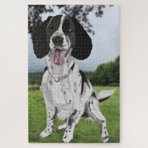 Zwarte en witte spaniel legpuzzel