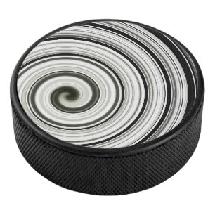 Zwarte en witte spiraal hockey puck