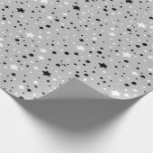 zwarte en witte sterren op grijs cadeaupapier (Hoek)