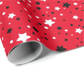zwarte en witte sterren op rood cadeaupapier (Rol Hoek)