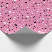 zwarte en witte sterren op roze cadeaupapier (Hoek)