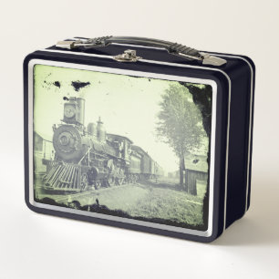 zwarte en witte stoomtrein