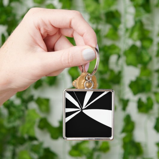 Zwarte en witte tand sleutelhanger (Hand)