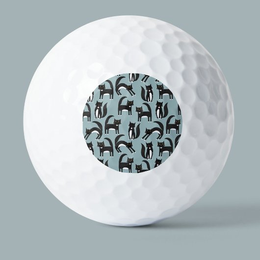 Zwarte en witte Tuxedo-katten Golfballen
