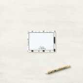 Zwarte en witte veren post-it® notes (Op bureau)