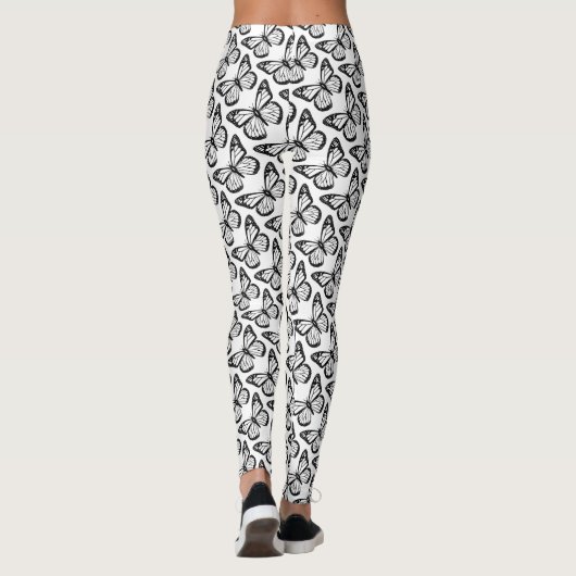 Zwarte en witte vlinder leggings (Achterkant)
