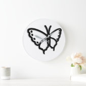 Zwarte en witte vlinder met grote klok (Huis)