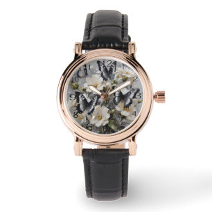 Zwarte en witte vlinders op witte bloemen, horloge