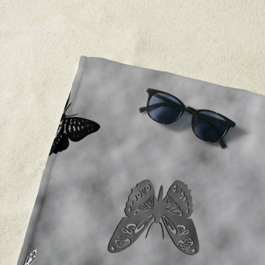 Zwarte en witte vlinders strandlaken (In situ)