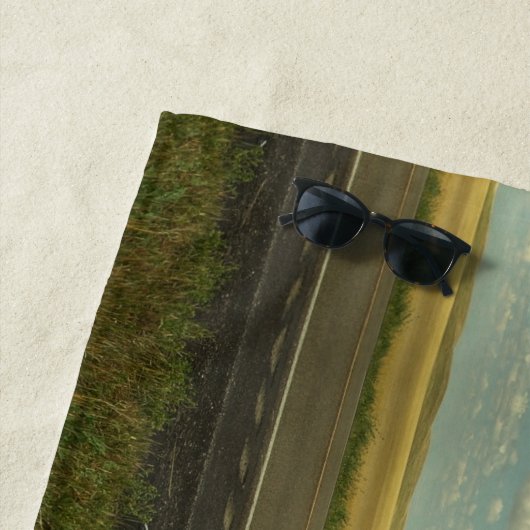 Zwarte en zilvermotor en blauwe hemel strandlaken (In situ)