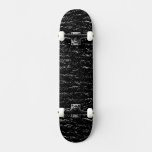 Zwarte en zilversteen skateboard