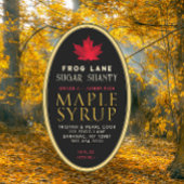 Zwarte esdoornsiroop met rood blad en rand ovale sticker