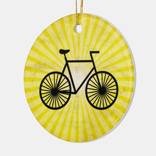 Zwarte fiets; gele achtergrond keramisch ornament (Links)