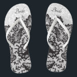Zwarte Floral Lace en witte glitter Teenslippers<br><div class="desc">Prachtige, uitziende Flip Flop Shoes met faux black floral lace op een faux witte glitterachtergrond die u kunt personaliseren met jouw naam of bridal party titles. ⭐ Dit product is 100% . ***** Klik op CUSTOMIZE BUTTON om toe te voegen, te verwijderen, te verplaatsen, te wijzigen, te roteren, enz.om het...</div>