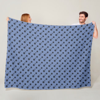 Zwarte florale afdruk op blauw fleece deken