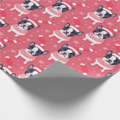 Zwarte franchise op roze kerst inpakpapier (Hoek)