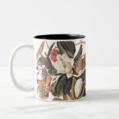 Zwarte gefactureerde koekoekjesvogels tweekleurige koffiemok (Links)