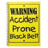 Zwarte gordel voor ongevalsProne Notitieboek (Voorkant)