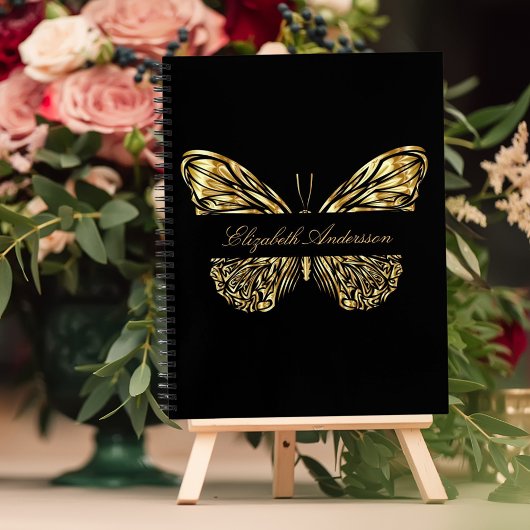 Zwarte goudbruine vlinder notitieboek
