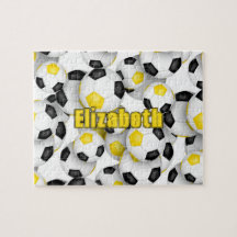 zwarte gouden ploeg kleuren jongens voetbal