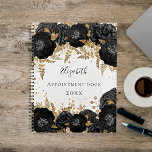 Zwarte goudflorale glitter naam wit 2023 planner<br><div class="desc">Een witte achtergrond met faux goudglitterstof en zwarte floralen met gouden bladeren. De naam wordt geschreven met een modern handgeschreven stijlmanuscript met letters. Personaliseer en voeg jouw naam,  titel en jaar toe.</div>
