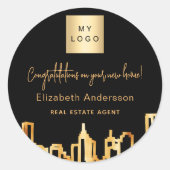 Zwarte goudstad skyline onroerend goed logo ronde sticker (Voorkant)