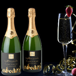 Zwarte goudstad skyline onroerend goed logo sparkling wijnetiket