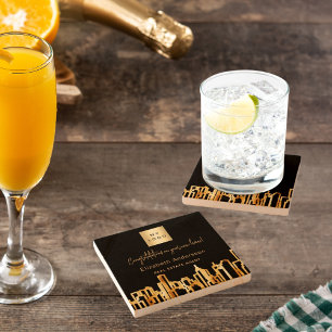 Zwarte goudstad skyline onroerend goed logo stenen onderzetter