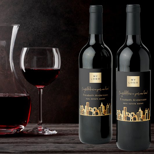Zwarte goudstad skyline onroerend goed logo wijn etiket