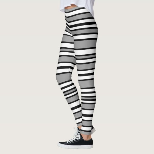 Zwarte, grijze en witte strepen leggings (Links)