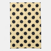 Zwarte haarpunten op bleek geel theedoek (Verticaal)