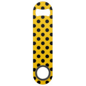 Zwarte haarpunten op geel speed flessenopener (Achterkant)