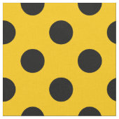 Zwarte haarpunten op geel stof (Close Up)